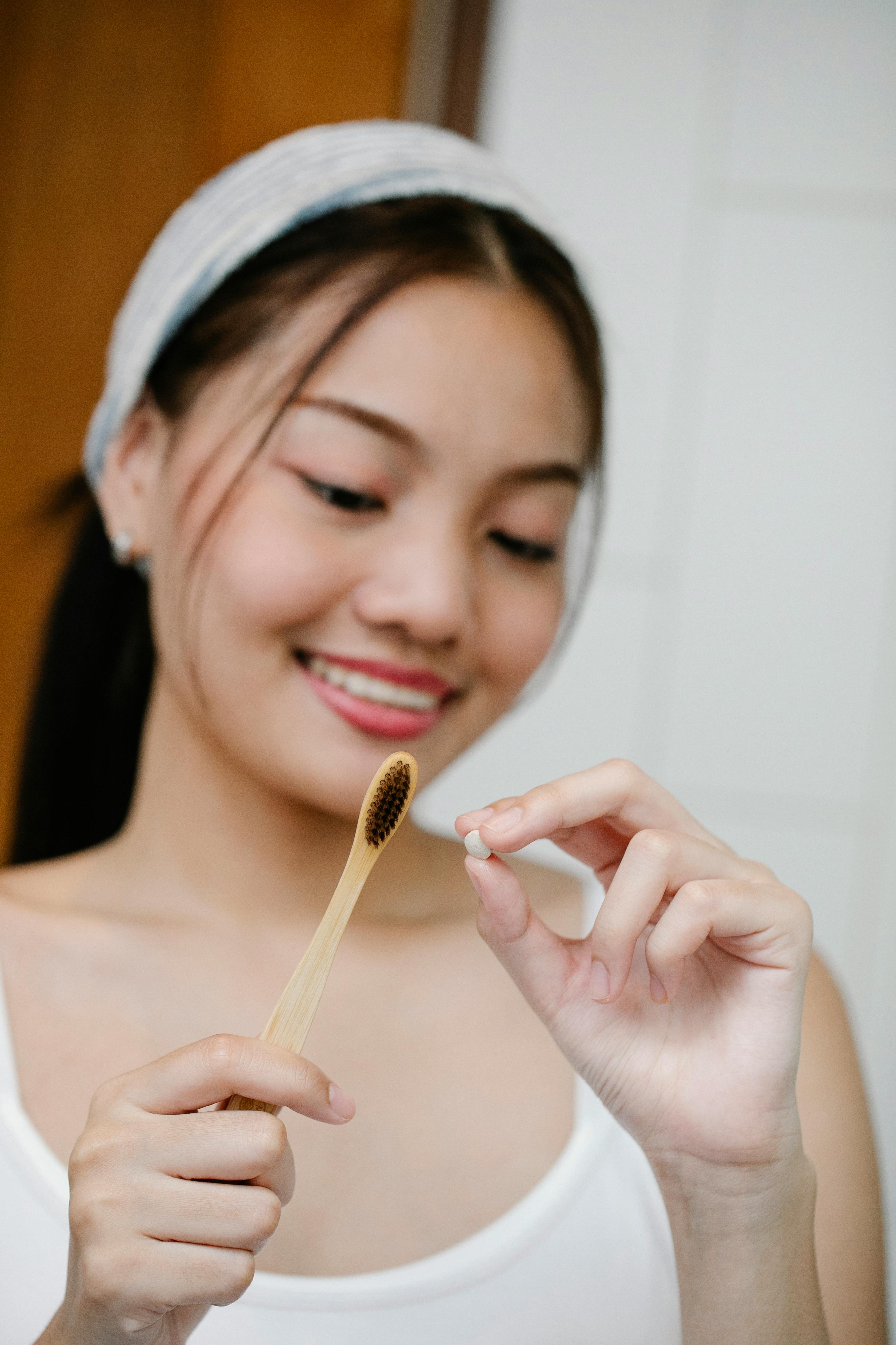 Patient preparing a toothbrush